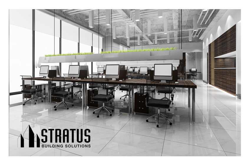 Large Office Interior with Clean White Hard Floors and Eight Computer Work Stations