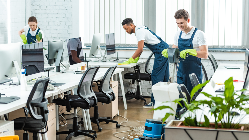 Day porter cleaning staff disinfecting office surfaces in Milwaukee